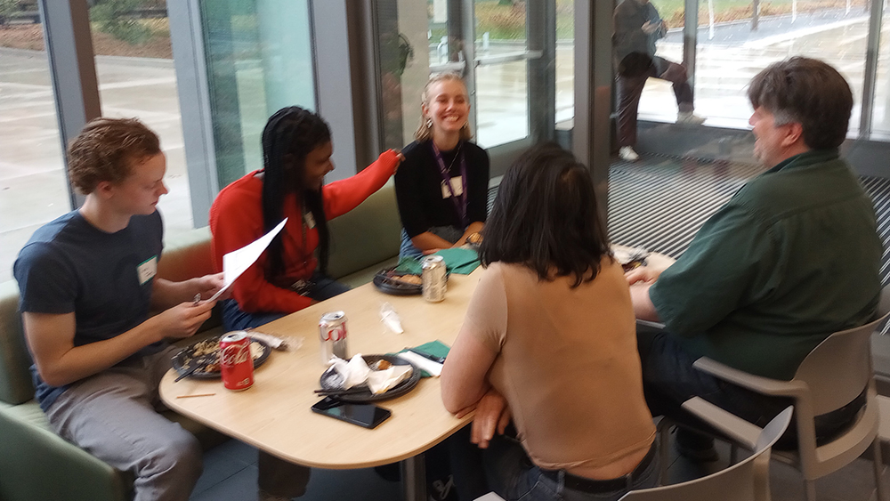 Lab having lunch at the retreat