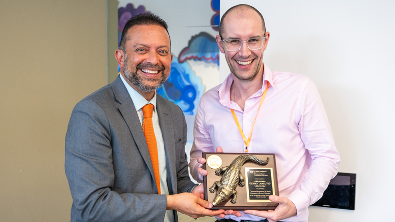 Geoffroy received the Gator award at UF (gator award)